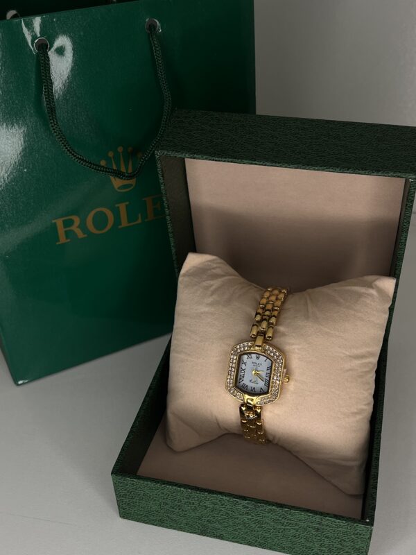 Rolex Lady – Or Jaune & Cadran Argent Strassé cadran bleu ciel